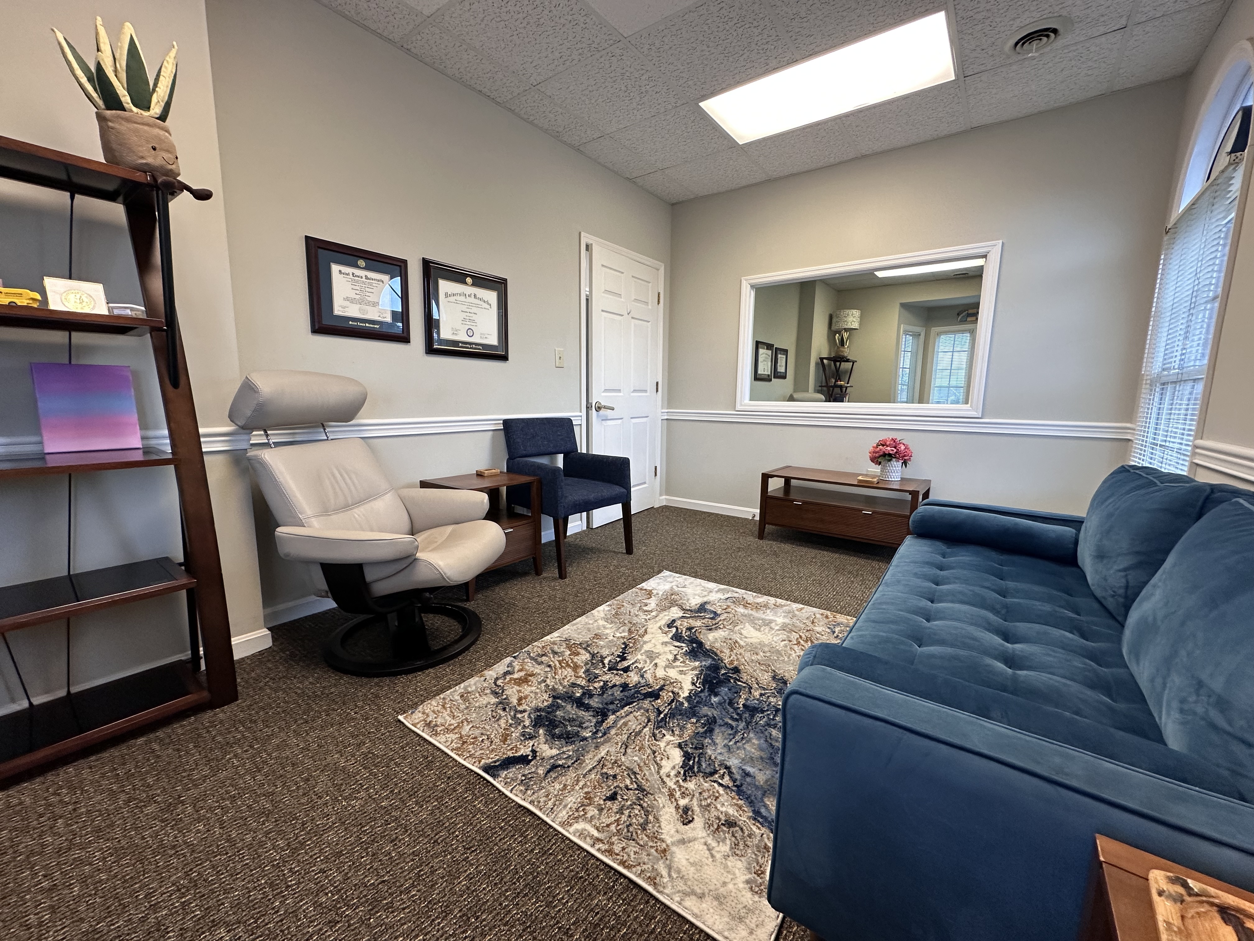 Anchored Psychology therapy office in Lexington, KY with seating for in-person therapy.